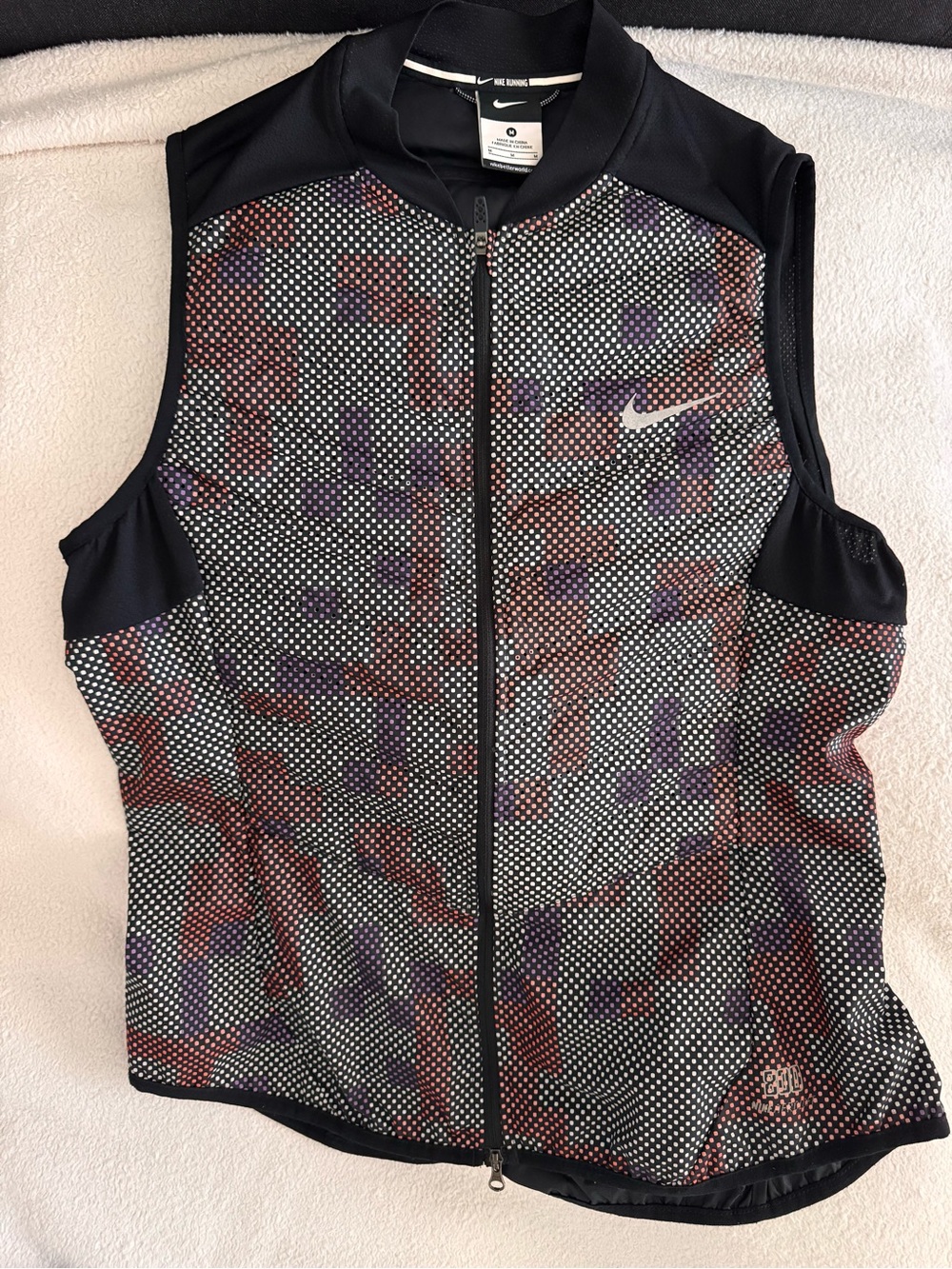 Nike Black Running Vest with Red & Purple Dot Accents